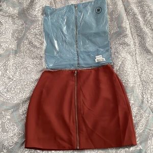 2 zip up skirts!